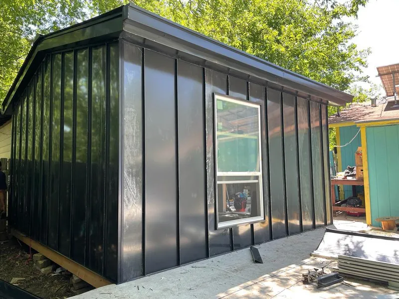 Black standing seam metal wall panels for Roof Inspection in Roy