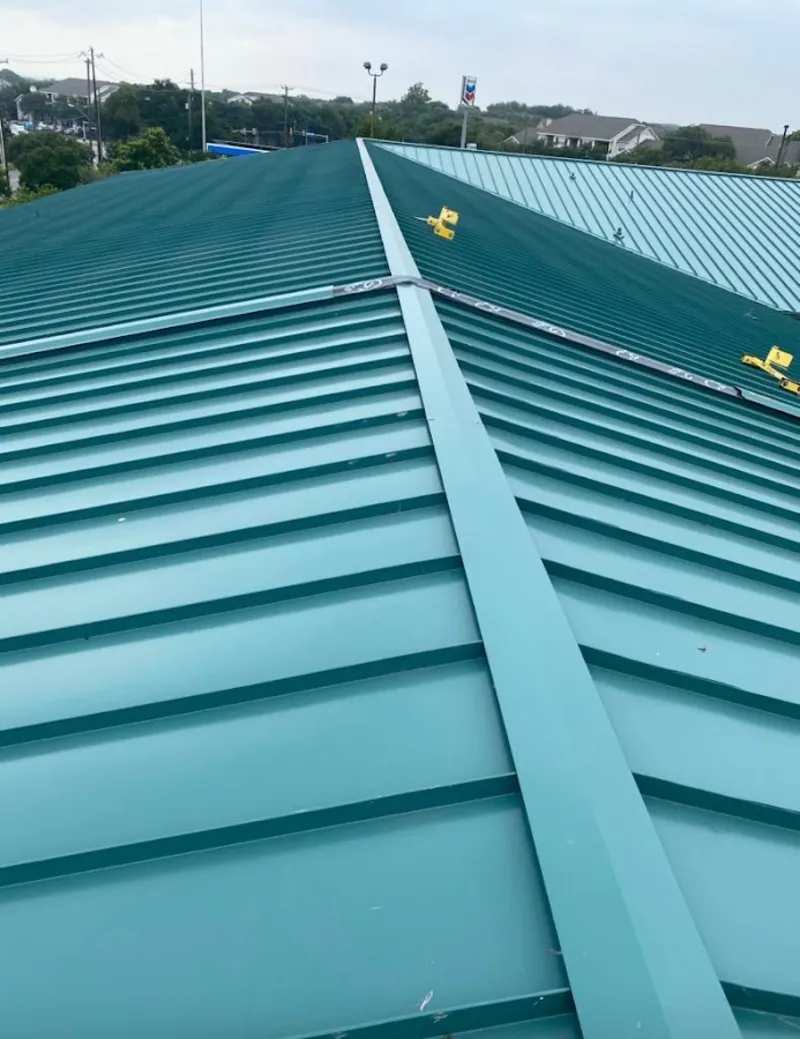 Green commercial metal roof ridge and valley for Metal Roof Repair in Roy